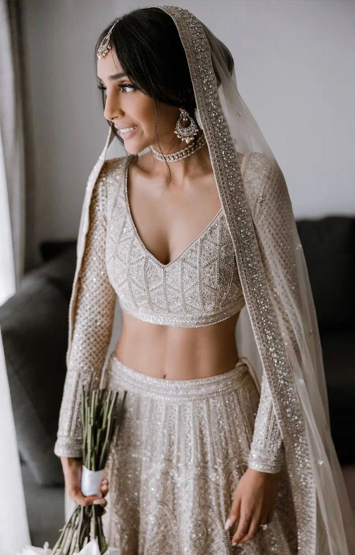 Our real bride in a lehenga made of gold materials